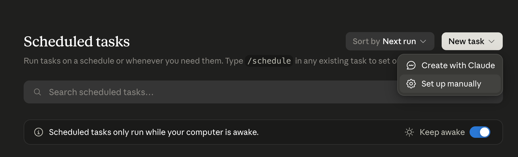 Cowork Scheduled tasks screen with the New task menu open, showing Create with Claude and Set up manually.